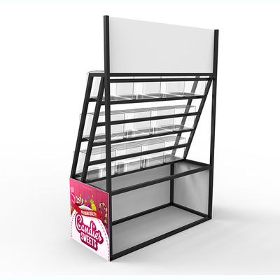 Punkt sprzedaży w supermarkecie wyświetla metalowe niestandardowe logo z półkami na cukierki